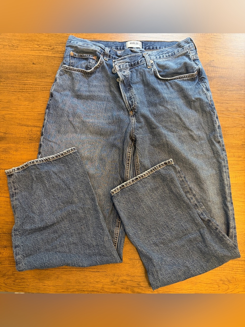 Agolde blue denim jeans with cross-cross buttons